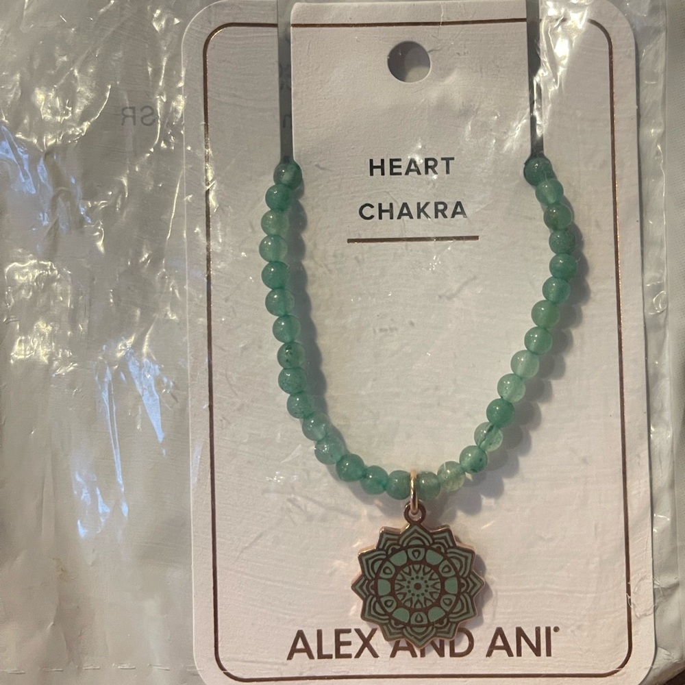 NWT NEVER OPENED- Alex and Ani stretch bracelet- Heart Chakra -Smoke Free Home